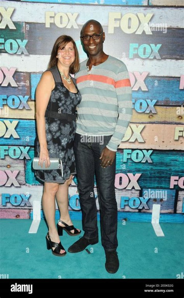 Lance Reddick and Stephanie Reddick at the 22nd Annual Elton John AIDS Foundation's Oscar Viewing Party in Los Angeles, California, on March 2, 2014. | Source: Getty Images
